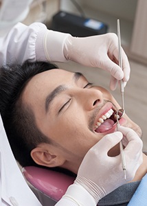 a patient undergoing a dental cleaning