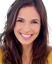 Woman with long brown hair smiling