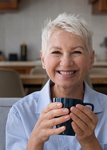 Woman smiling on a couch