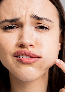 a closeup of a woman with a swollen mouth