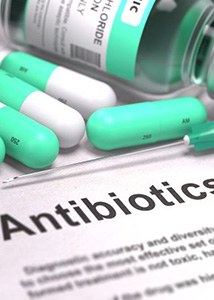 Antibiotic medications on top of document about antibiotics