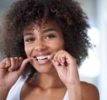 woman flossing