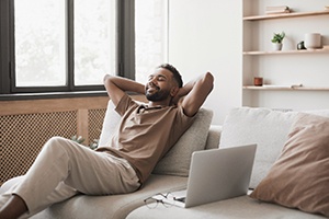 a person relaxing on a couch 