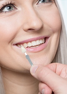 patient getting veneers and smiling 