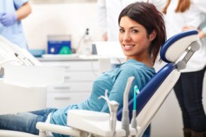 WOman smiling in dentist's chair.