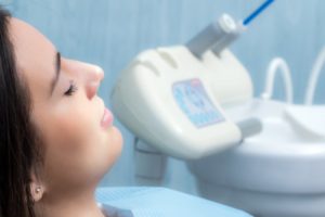 Woman relaxing in dentist’s chair.