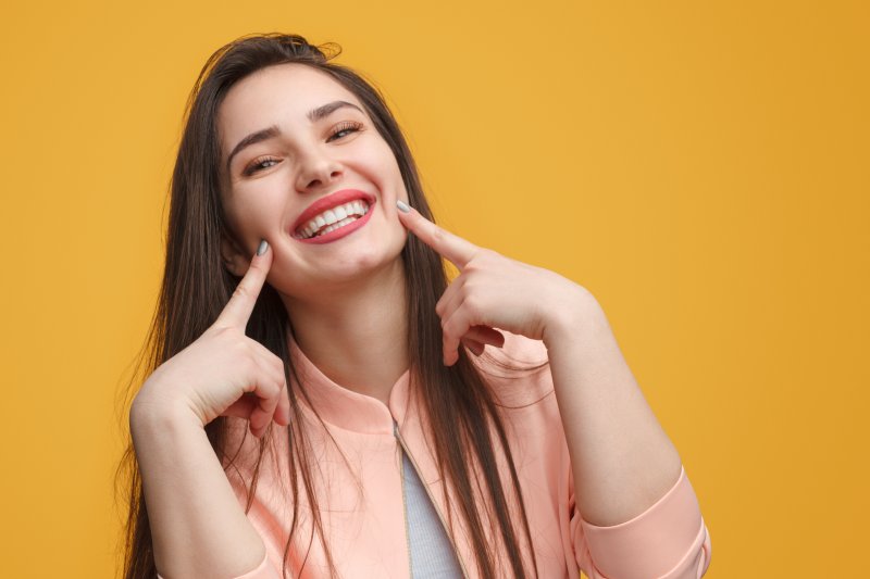 Woman shows smile